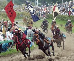 Tourists enjoy traditional horse race